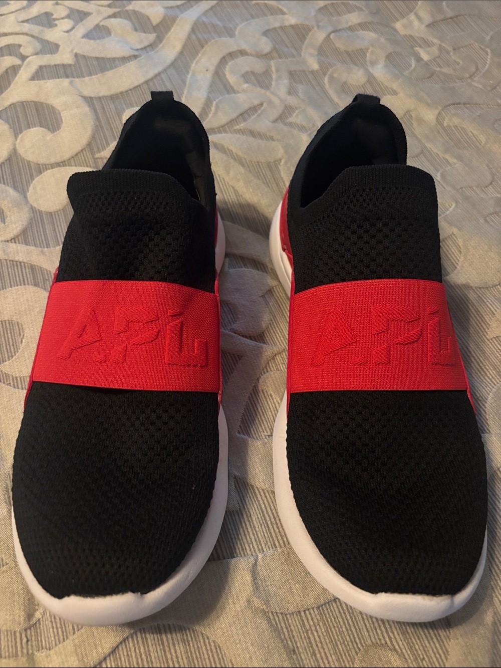 APL Black Slip-On Sneakers with Red Accents